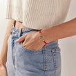 Load image into Gallery viewer, Round Multicolored Tree of Life Red String Bracelet worn by a model on her left wrist
