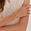 Load image into Gallery viewer, Round Multicolored Tree of Life Red String Bracelet worn by a model on her right wrist
