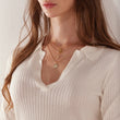 Load image into Gallery viewer, three Star of David Gold Square Pendant Necklace worn on the neck by a female model wearing a white shirt
