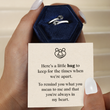 Load image into Gallery viewer, Personalized Family Hug Ring inside the blue hexagon box with a minimalist design message card
