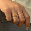 Load image into Gallery viewer, A model wearing a 111 angel number gold ring
