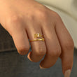 Load image into Gallery viewer, A model wearing a 999 Angel Number Gold ring
