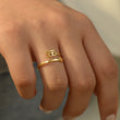 Load image into Gallery viewer, A model wearing a 555 angel number gold ring
