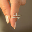 Load image into Gallery viewer, A model holding an Angel number 111 silver ring

