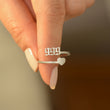 Load image into Gallery viewer, A model holding a 999 Angel Number Silver ring
