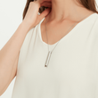 Load image into Gallery viewer, Model wearing a Breathing Necklace and on a white background
