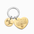 Load image into Gallery viewer, Personalized calendar gold plated keychain on a white background
