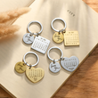 Load image into Gallery viewer, Four pieces of Personalized calendar keychain placed on top of a book

