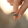 Load image into Gallery viewer, Female model holding Mom of an Angel Personalized Wing Ring
