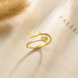 Load image into Gallery viewer, 111 angel number gold ring placed on top of a piece of paper
