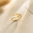 Load image into Gallery viewer, 222 Angel number gold ring placed on top of a piece of paper
