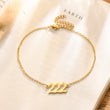 Load image into Gallery viewer, 222 Angel number gold anklet placed on top of a piece of paper
