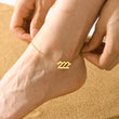 Load image into Gallery viewer, A model wearing a 222 Angel Number Gold Anklet
