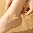 Load image into Gallery viewer, A model wearing a 666 Angel Number gold-plated Anklet
