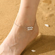 Load image into Gallery viewer, A model wearing a 222 Angel Number Silver-plated Anklet
