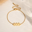 Load image into Gallery viewer, Angel Number 666 gold bracelet on a canvas background
