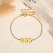 Load image into Gallery viewer, Angel Number 999 gold bracelet on a canvas background
