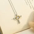 Load image into Gallery viewer, To My Soulmate Cross and Heart Necklace displayed on the top of a book
