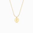 Load image into Gallery viewer, Gold disc pendant with engraved initial on gold necklace on white background
