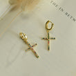 Load image into Gallery viewer, Multicolored Cross Gold Earrings placed on top of a blank paper

