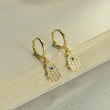 Load image into Gallery viewer, Gold and diamond blue stone hamsa hand earrings
