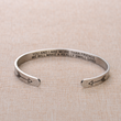 Load image into Gallery viewer, You And I Are More Than Friends We Will Make A Really Small Gang silver plated bracelet on top of a brown cloth
