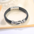 Load image into Gallery viewer, &quot;Grandparents and Grandson Forever Linked Together&quot; Braided Leather Bracelet placed on top of a table

