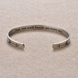 Load image into Gallery viewer, Father memorial silver bracelet with message &quot;Dad, you walk beside me every day&quot; placed on top of a brown fabric
