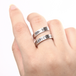 Load image into Gallery viewer, Be fearless spiral ring worn by a model on her middle right finger
