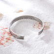 Load image into Gallery viewer, Motivational message engraved in a silver cuff bracelet for best friend
