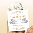 Load image into Gallery viewer, Personalized Couple Name Ring in a case behind an inspirational note
