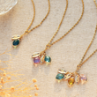 Load image into Gallery viewer, Crystal Birthstones and Leaves Necklace on canvass background
