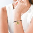 Load image into Gallery viewer, Two-Tone Bracelet with a printed message &quot;You are the sister I got to choose&quot; worn by a female model
