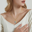 Load image into Gallery viewer, model wearing Crystal Birthstones and Leaves Necklace 
