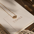 Load image into Gallery viewer, Multicolored Corner Evil Eye Necklace on top of a SVANA Design card
