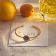 Load image into Gallery viewer, Pave Blue Evil Eye Beaded Bangle on top of a SVANA Design card
