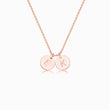 Load image into Gallery viewer, 2 Rose gold disc pendants with engraved initial on rose gold necklace on white background
