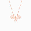 Load image into Gallery viewer, 3 Rose gold disc pendants with engraved initial on rose gold necklace on white background
