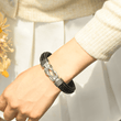 Load image into Gallery viewer, Female model wearing Braided Leather Bracelet 
