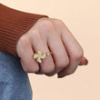 Load image into Gallery viewer, Female model wearing To My Daughter Windmill Fidget gold plated Ring in her ring finger
