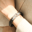 Load image into Gallery viewer, Female model wearing Mother and Daughter Forever Linked Together Braided Leather Bracelet on her left wrist
