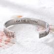 Load image into Gallery viewer, &quot;I am the storm&quot; bracelet placed on top of grain of sand
