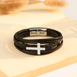 Load image into Gallery viewer, The Day I Lost You Leather Cross Bracelet with silver cross and clasp on an open book
