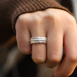 Load image into Gallery viewer, personalized Silver plume ring being worn by a model on her right ring finger
