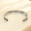 Load image into Gallery viewer, To My Husband, No One Misses You More Than Me Memorial Bracelet on a page of an open book
