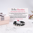 Load image into Gallery viewer, To Our Grandson, Love Grandma &amp; Grandpa bracelet on top of a folded note
