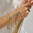 Load image into Gallery viewer, A model wearing Victorian Turquoise Evil Eye Bracelet and other Evil Eye bracelets
