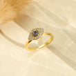Load image into Gallery viewer, To My Granddaughter Evil Eye Fidget Ring Displayed in a white fabric
