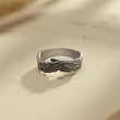 Load image into Gallery viewer, Mom, Be Free in Heaven Personalized Angel Wing Ring on a page of an open book
