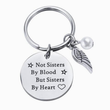 Load image into Gallery viewer, Love Package “Not Sisters By Blood But Sisters By Heart” keychain
